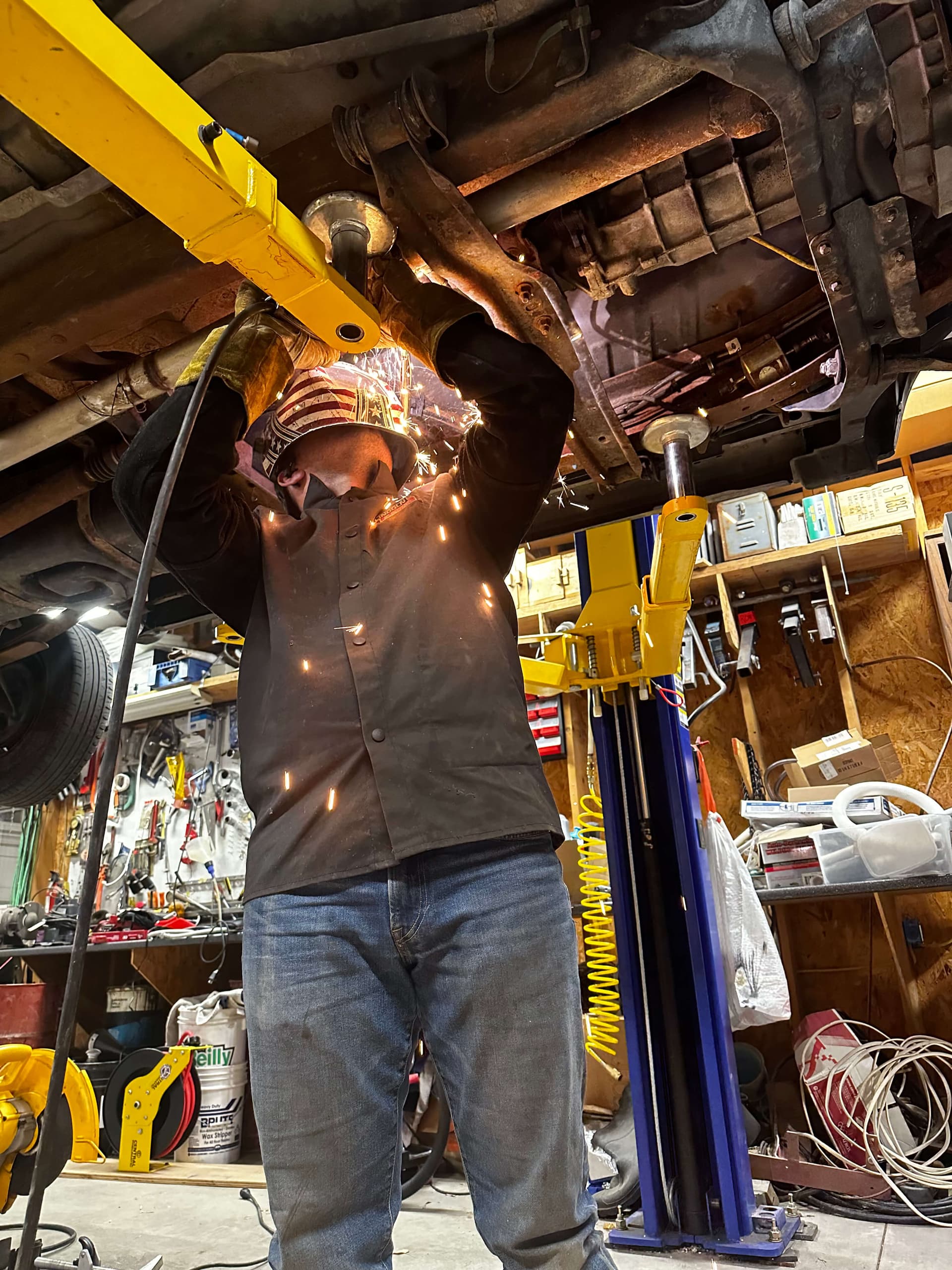Professional mobile welding services in Northern Utah - Triumph Welding technician working under vehicle